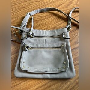 Gray, crossbody bag with gold hardware. Adjustable straps. Vacation, summer